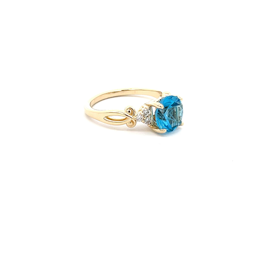 Lone Star Cut Blue Topaz Yellow Gold Ring