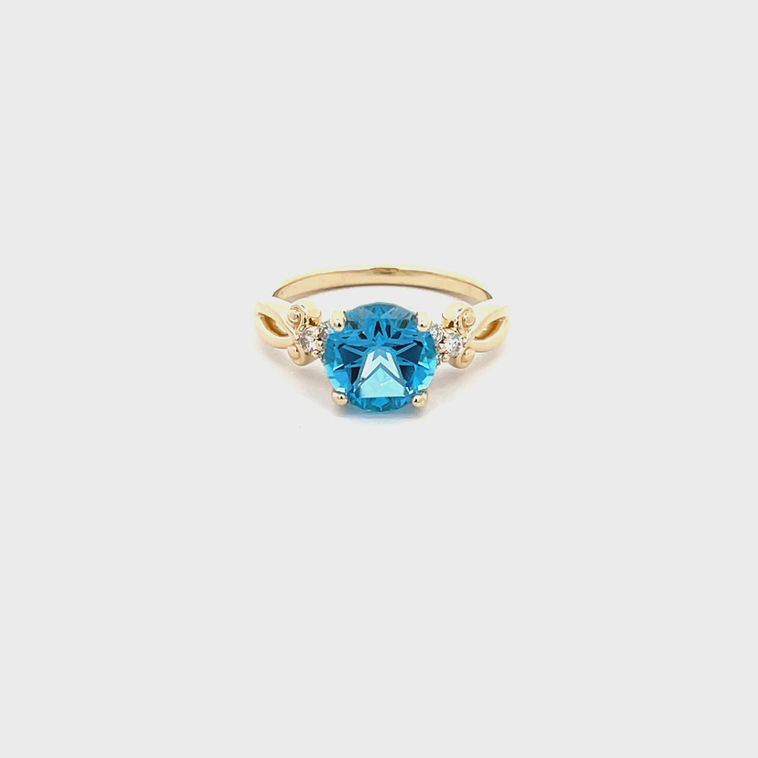 Lone Star Cut Blue Topaz Yellow Gold Ring